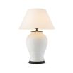 Eichholtz ceramic white table lamp with fish design and off-white shade