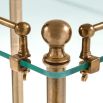 A three-tier bathroom rack with an iron vintage brass finish by Eichholtz 