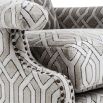 Designer luxury armchair with thick grey patterned velvet design