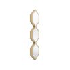 A glamorous wall mirror by Eichholtz with three hexagonal bevelled mirrors and a gold finish 