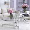 round silver table with acrylic rods and silver finish