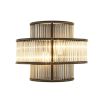 A glamorous, statement wall light from Eichholtz featuring clear glass rods and a bronze finish 