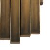 A vintage art deco inspired wall lamp with decorative alternating brass features