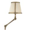 Elegant wall lamp with graceful stem and choice of black or cream lampshade