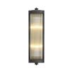 A luxurious matte bronze wall lamp with clear reeded glass 