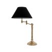 a gorgeous art deco inspired table light with a brass finish and a black velvet shade