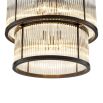 A glamorous statement bronze and glass ceiling lamp