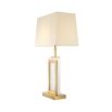 An elegant alabaster and matte brass table lamp with white shade 