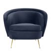 Retro round midnight blue velvet chair with tapered legs