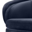 Retro round midnight blue velvet chair with tapered legs