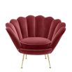 Red art-deco inspired chair with shell design back and gold legs