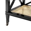 A stunning black mahogany and rattan console table with  a glass surface