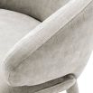 Luxurious Eichholtz neutral toned dining chair with armrests 