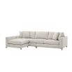 sand coloured L shaped sofa with black legs and four scatter cushions 