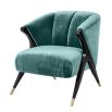 Designer luxury armchair upholstered in Aegean green crushed velvet with black/brass legs