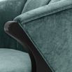 Designer luxury armchair upholstered in Aegean green crushed velvet with black/brass legs