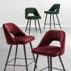 Luxurious modern dark green velvet counter stools by Eichholtz