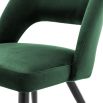 Contemporary green velvet dining chair with brass capped tapered legs