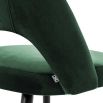 Contemporary green velvet dining chair with brass capped tapered legs
