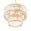 Statement clear glass chandelier with antique brass detailing