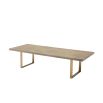 A luxurious rectangular oak wooden dining table with a brushed brass base