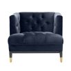 blue velvet armchair with deep-buttoning and black & brass legs 