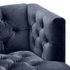 blue velvet armchair with deep-buttoning and black & brass legs 