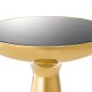 Sleek low gold side table with black glass table top