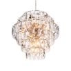 A breathtakingly glamorous chandelier by Eichholtz featuring a sparking crystal glass design that will enrich your interior with everlasting luxury 