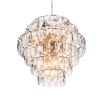 A breathtakingly glamorous chandelier by Eichholtz featuring a sparking crystal glass design that will enrich your interior with everlasting luxury 