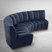 A luxury blue modular sofa with black legs