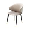 Luxury beige velvet dining chair with black and gold tapered legs