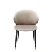 Luxury beige velvet dining chair with black and gold tapered legs