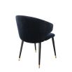 Luxury midnight blue velvet dining chair with black and gold tapered legs