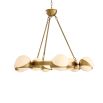 A gorgeous mid-century modern chandelier with white glass and brushed brass elements