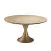 natural washed oak dining table with hourglass base in brushed brass