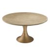 natural washed oak dining table with hourglass base in brushed brass