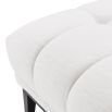 white sumptuous bench with black tapered legs 