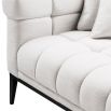 white lounge sofa with contrasting black legs 