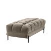 A luxurious deep-buttoned velvet bench with black legs