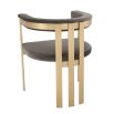 taupe upholstered chair with brushed brass frame 