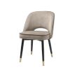 Classic and chic set of 2 dining chairs from Eichholtz upholstered in a greige velvet fabric