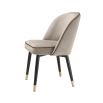 Classic and chic set of 2 dining chairs from Eichholtz upholstered in a greige velvet fabric