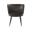 A classy dining chair with a grey velvet upholstery, swivel seat and golden capped feet 