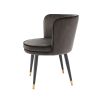 A classy dining chair with a grey velvet upholstery, swivel seat and golden capped feet 