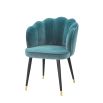 turquoise clamshell-shaped with black tapered legs with gold accents 