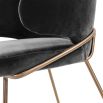 dark grey velvet dining chair with a brushed brass frame