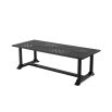 a large rectangular outdoor dining table in black 