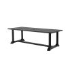 a large rectangular outdoor dining table in black 