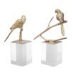 Eichholtz vintage brass decorative bird object on a clear acrylic base set of 2 